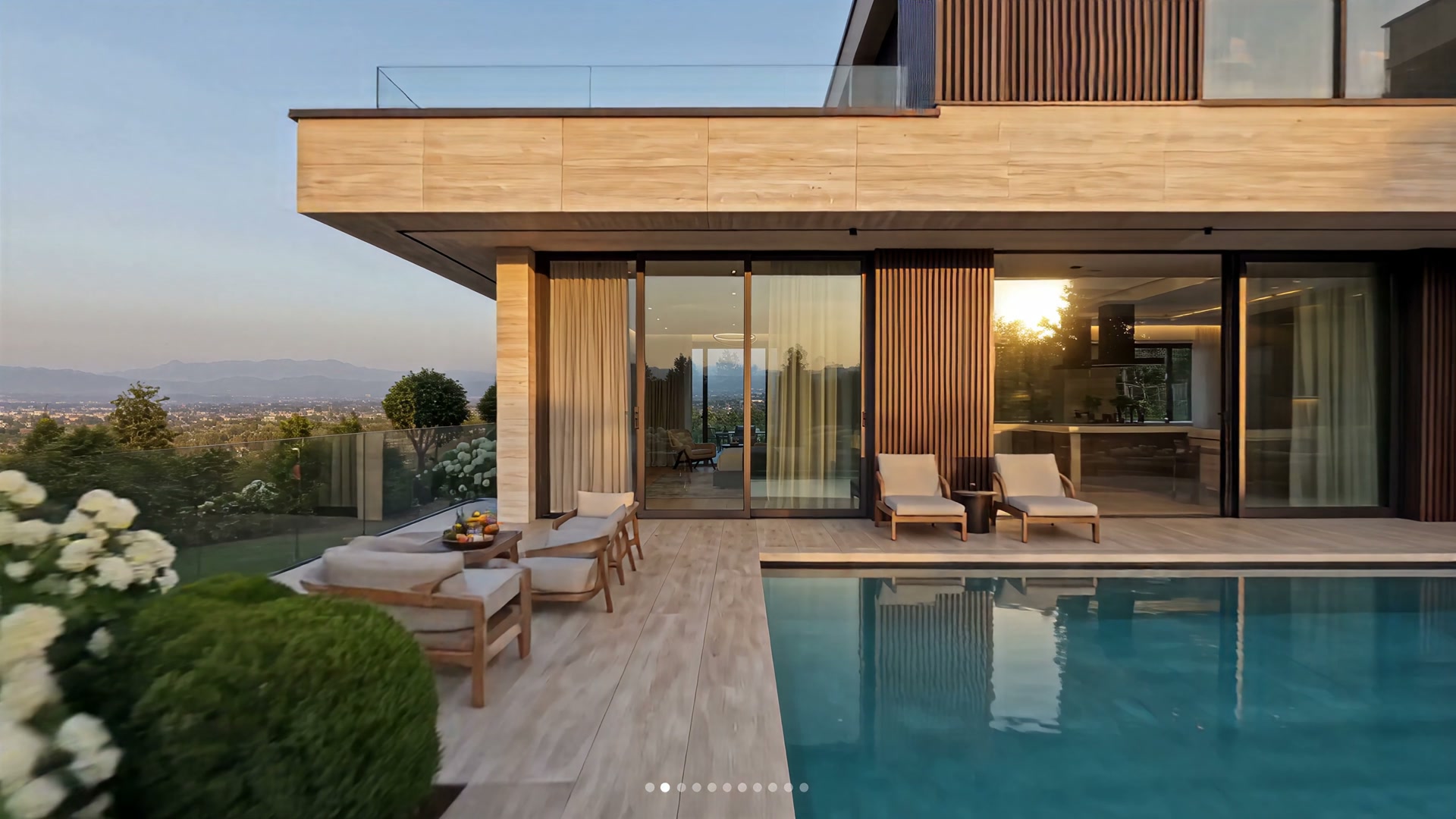 Travertine pool deck with valley view at golden hour